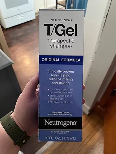 T/Gel Original Formula carton held in hand