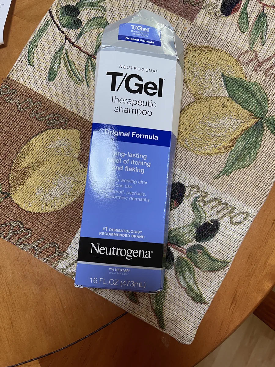 T/Gel carton standing on a patterned table